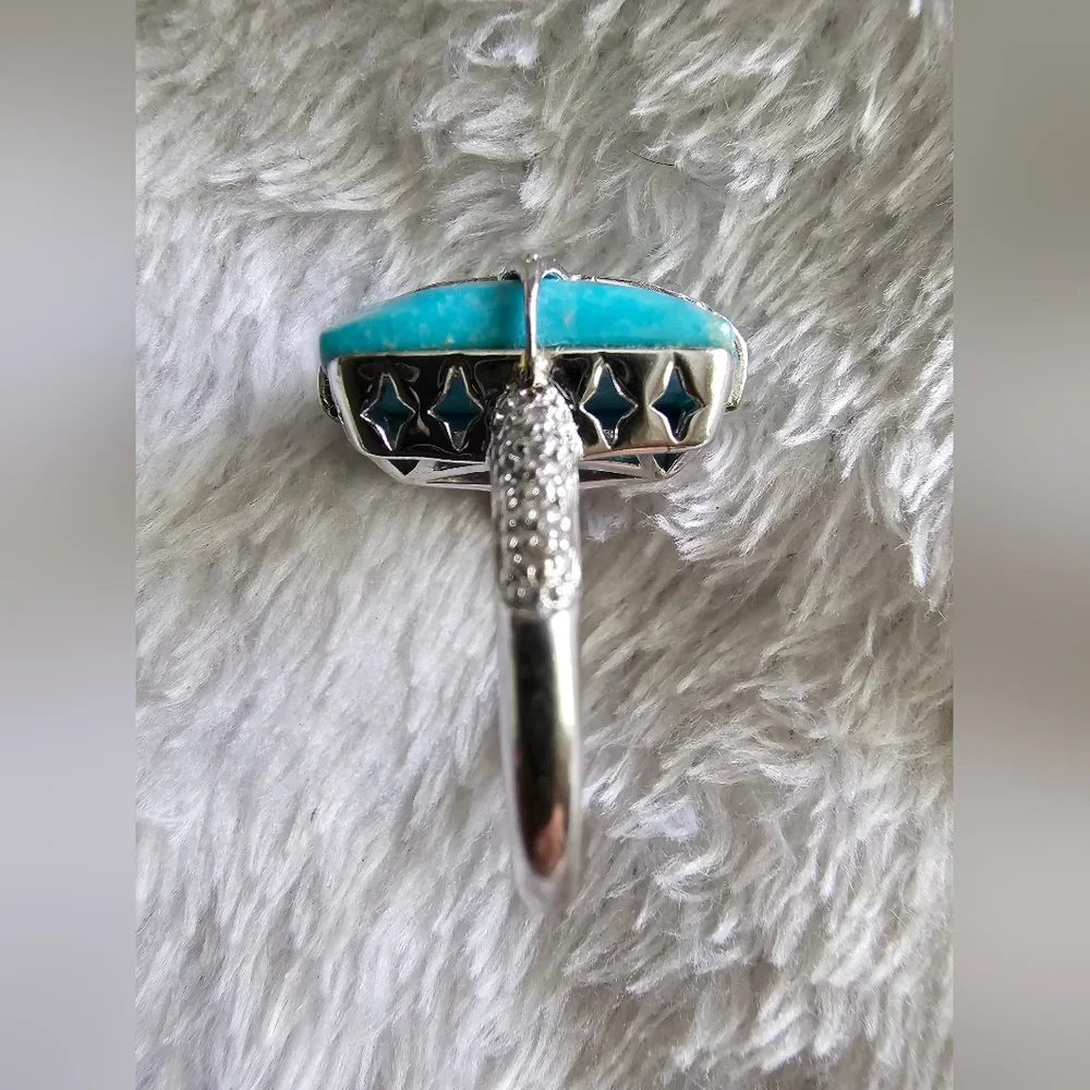 Turquoise and white topaz silver ring